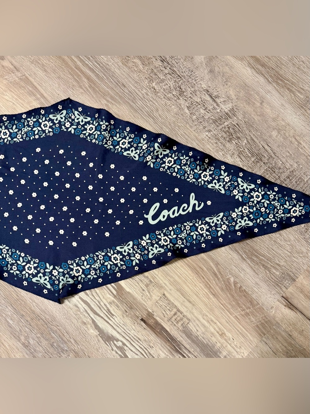 Coach diamond-shaped silk scarf with a floral and butterfly pattern. Blue and mi